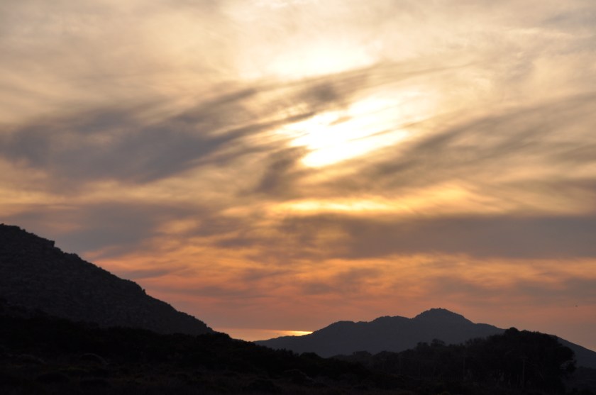 S Africa wispy sunset, water reflection