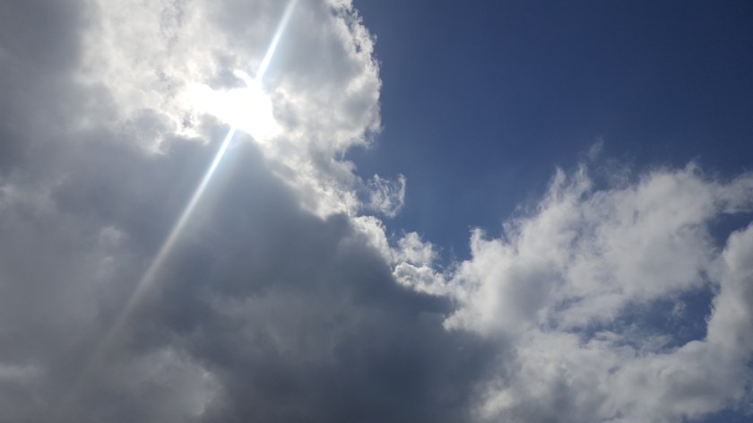 Sun glory behind clouds