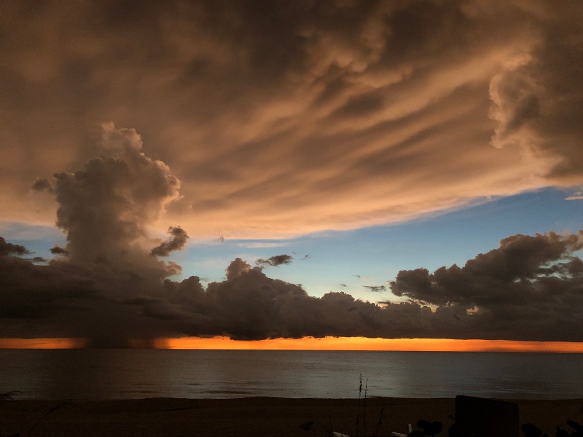 Sunset w orange, clouds, rain