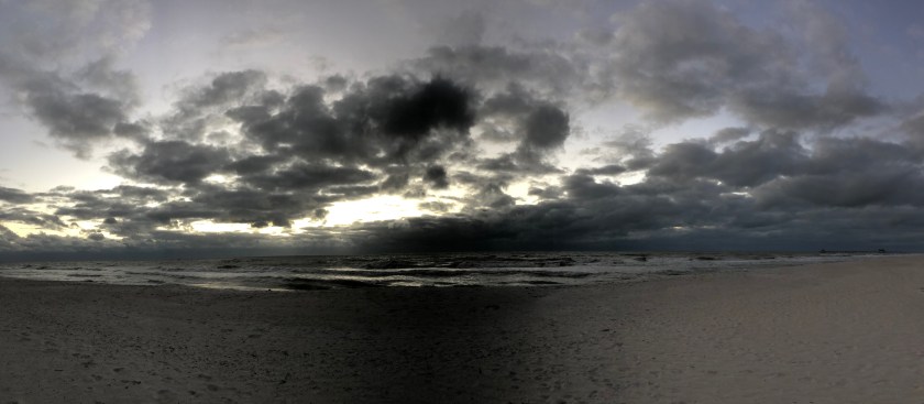 November grey sunset on rough Gulf, pano